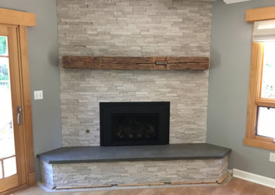 Black Concrete Hearth with Stone Fireplace (1)