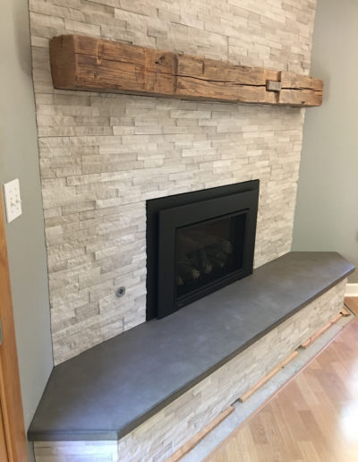 Black Concrete Hearth with Stone Fireplace (4)